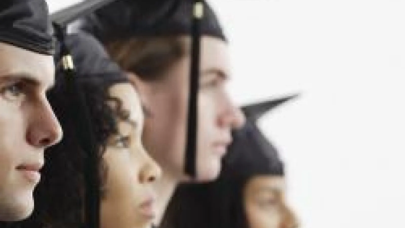 Students graduating in cap and gown