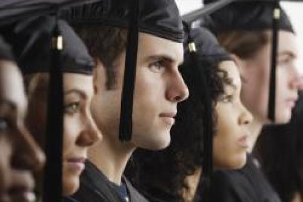 Image of students in graduation cap and gowns