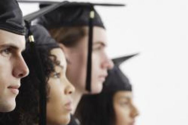 Students graduating in cap and gown