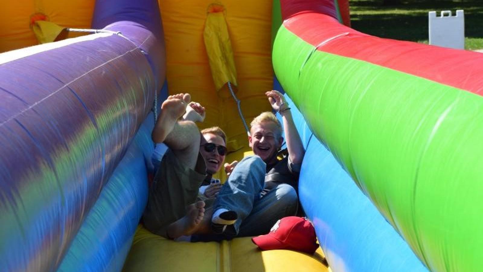 Two Students on inflatable at field day